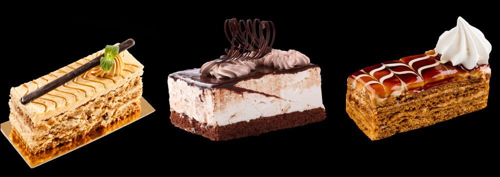 Three elegant pareve desserts—a classic mille-feuille, a chocolate mousse cake, and a caramel-glazed mille-feuille—beautifully presented against a black backdrop.